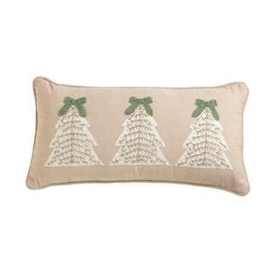 Beige lumbar pillow with three white beaded Christmas trees and green bows