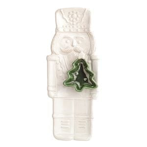White ceramic nutcracker chip and dip tray with green Christmas tree bowl accent
