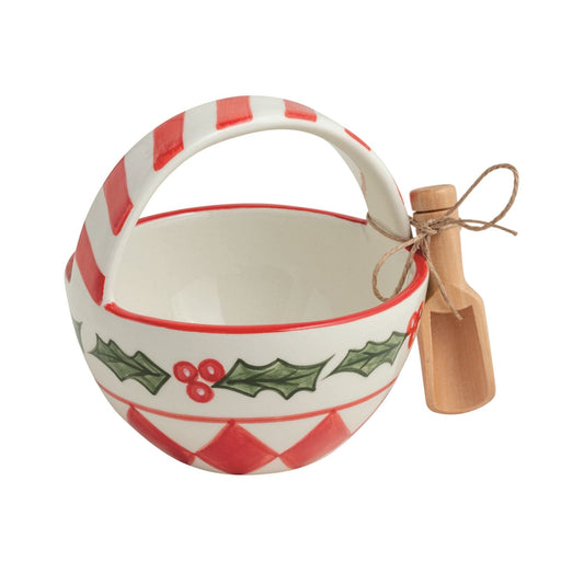 Red and white hand-painted ceramic Christmas bowl with holly motif and wooden scoop