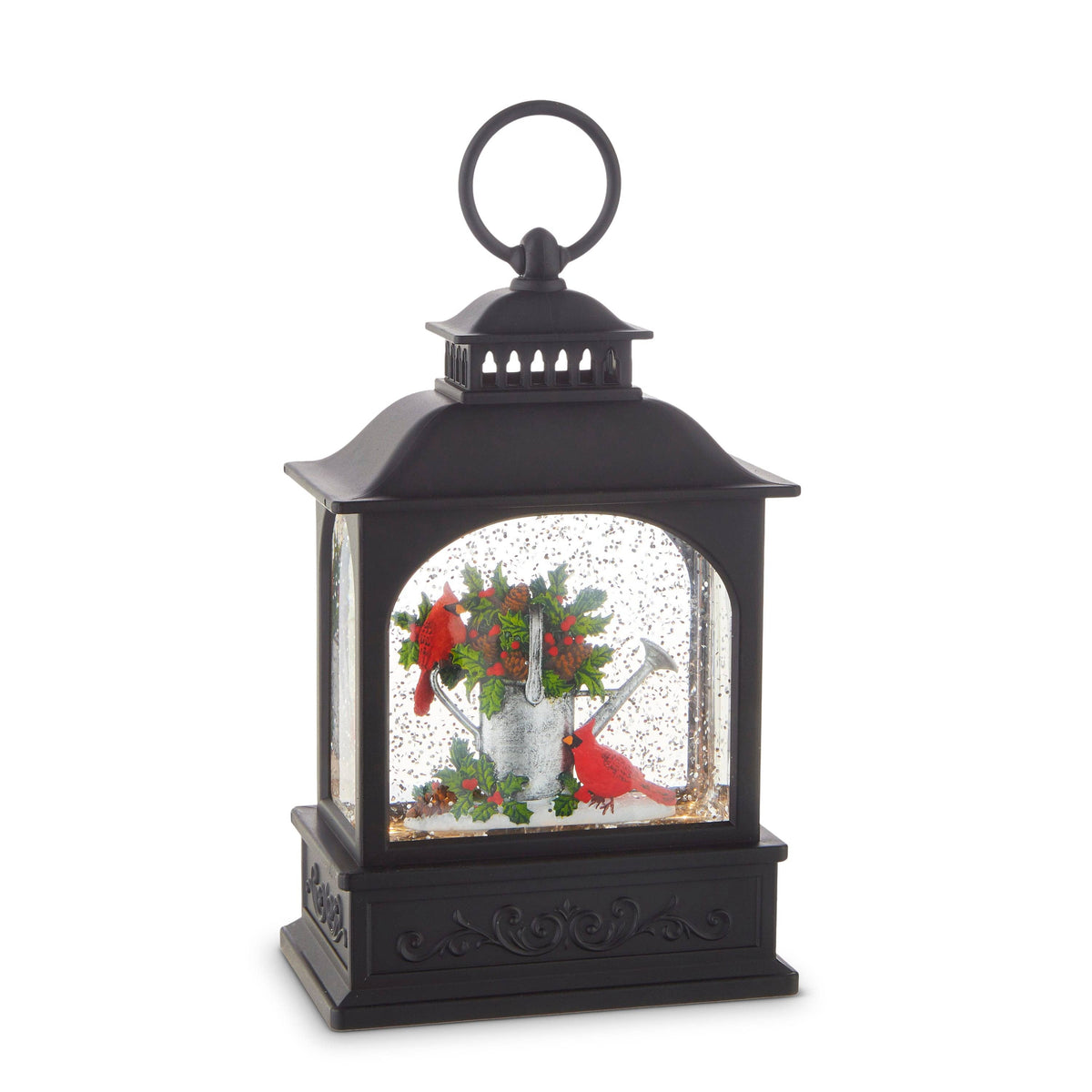 Black lantern-style lighted water globe with red cardinals and holly-filled watering can inside