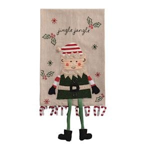 Beige linen hand towel featuring an embroidered elf with green felt dangle legs
