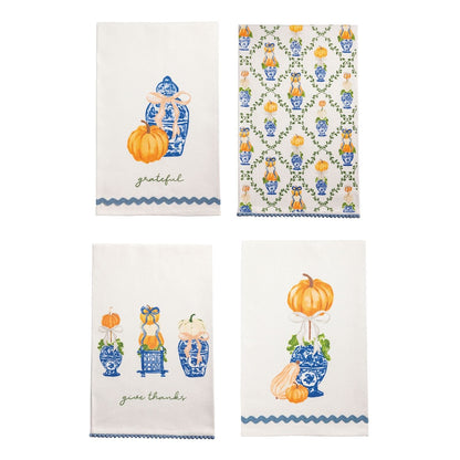 Set of 4 white kitchen towels with blue and orange pumpkin topiary designs