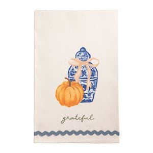 Ivory cotton kitchen towel with blue ginger jar, orange pumpkin, and grateful script