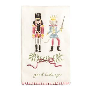 White kitchen towel with nutcracker and mouse king embroidery, good tidings text