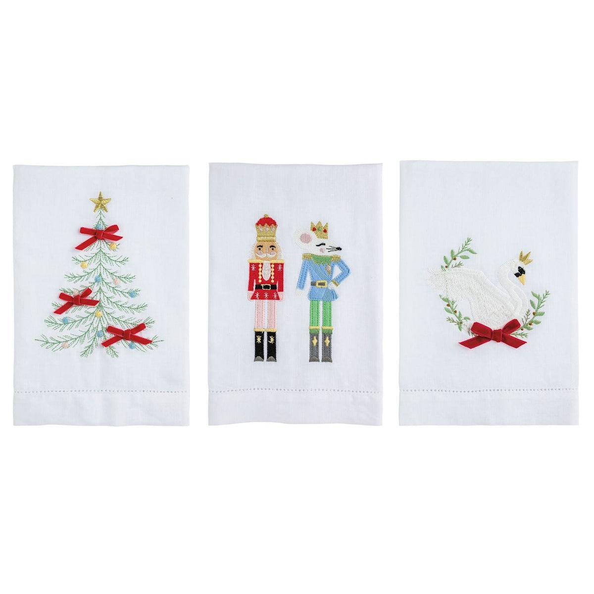 Set of 3 white embroidered holiday hand towels featuring Christmas tree, nutcracker duo, and swan