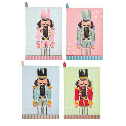 Set of 4 festive nutcracker printed kitchen towels in pink, green, blue, and red