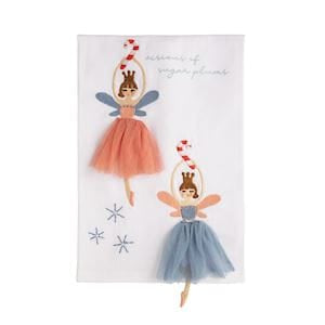 White kitchen towel featuring two sugar plum fairy ornaments with tulle skirts