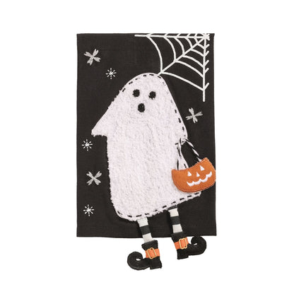 Black Halloween hand towel with embroidered ghost holding jack-o-lantern bag and witch legs