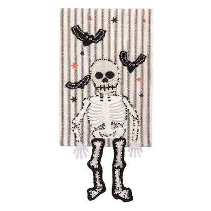 Striped Halloween hand towel with beaded skeleton and bat appliqués, dangle legs