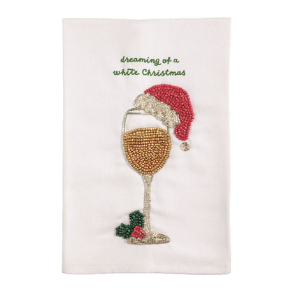 White beaded towel with wine glass and Santa hat, dreaming of a white Christmas