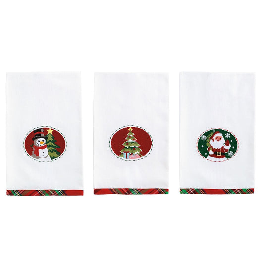 Set of three white Christmas kitchen towels with needlepoint snowman, tree, and Santa medallions
