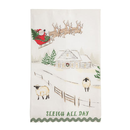 Cream kitchen towel with Santa sleigh, farmhouse, sheep, and Sleigh All Day text