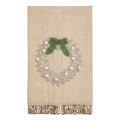 Beige linen hand towel with beaded Christmas wreath, green bow, pearl accents, fringe trim