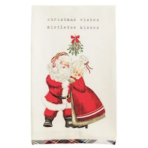 Cream kitchen towel with Santa and Mrs. Claus under mistletoe, plaid hem