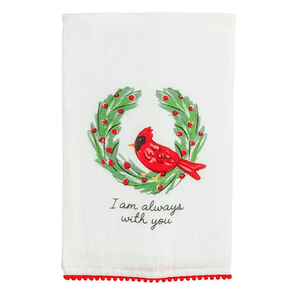 White kitchen towel with red cardinal on green wreath and red pom trim
