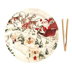 Round ceramic plate with vintage Santa sleigh scene and wooden tongs set