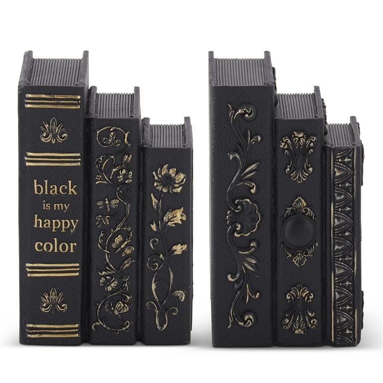 Black and gold resin stacked spell books with ornate floral gothic embossed detailing