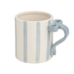Cream ceramic mug with blue vertical stripes and sculpted bow handle