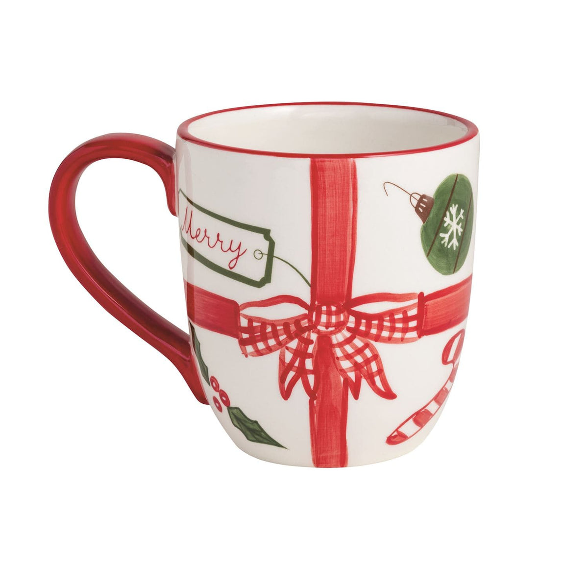 White ceramic Christmas mug with red ribbon bow, holly, ornament, and Merry gift tag design