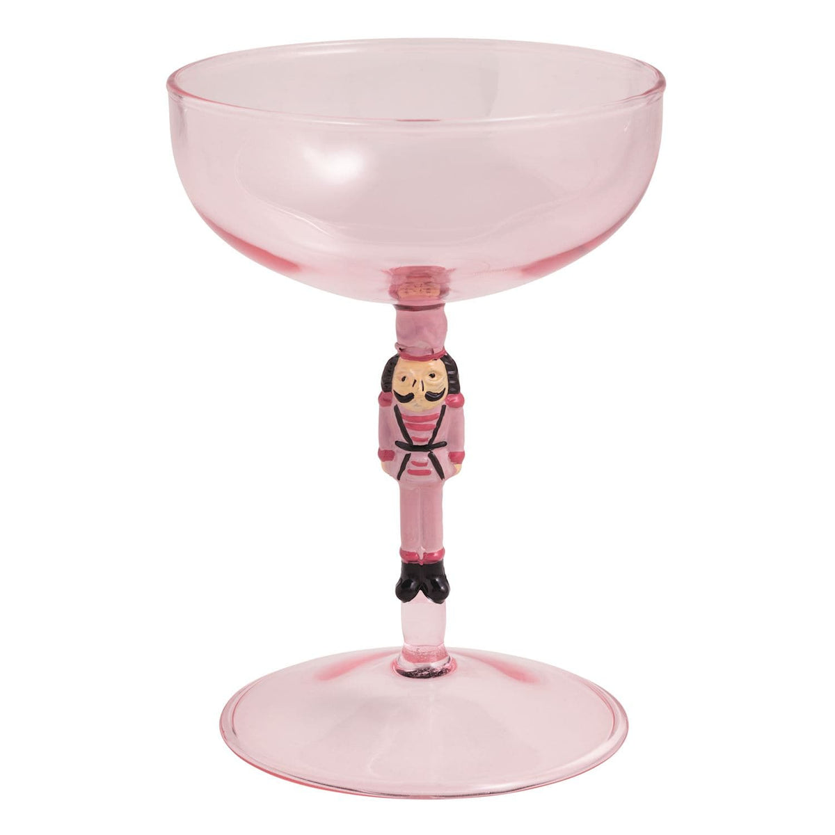 Pink glass coupe with nutcracker soldier stem figurine, Christmas cocktail glass