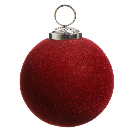Round flocked velvet ball ornament in deep red with silver decorative cap and hanging ring