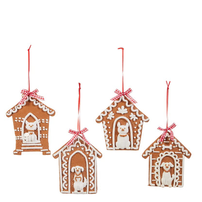 Four gingerbread doghouse Christmas ornaments with white icing and red ribbon bows
