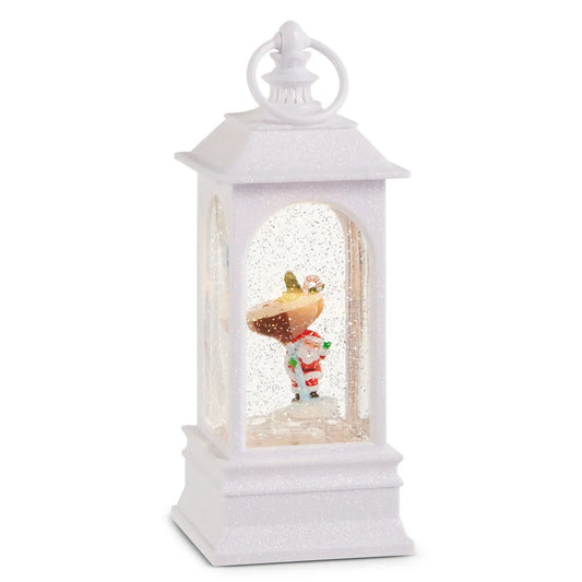 White glitter lantern snow globe with Santa Claus and espresso martini figurine inside