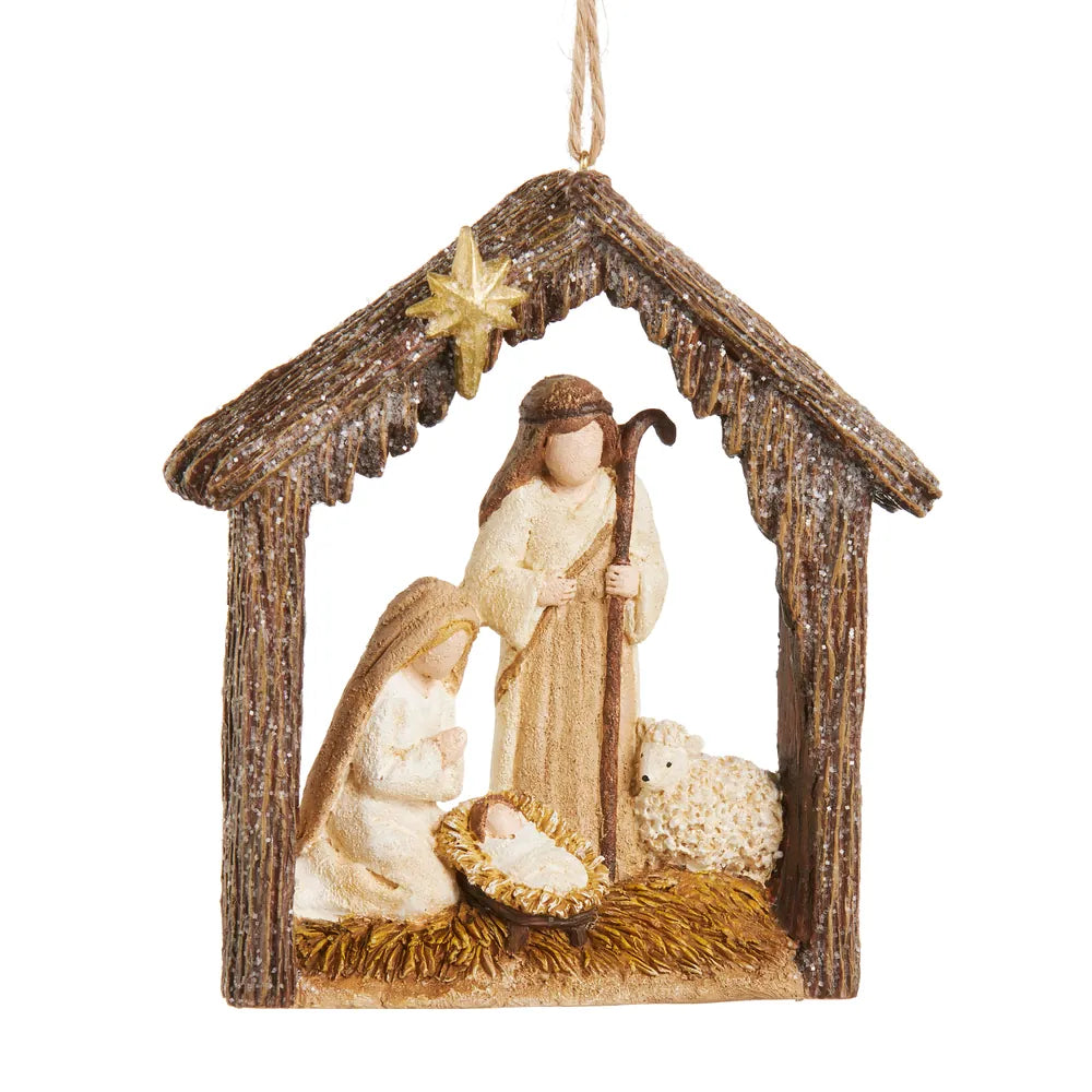 Resin nativity ornament with Holy Family, star, and lamb in rustic wood stable