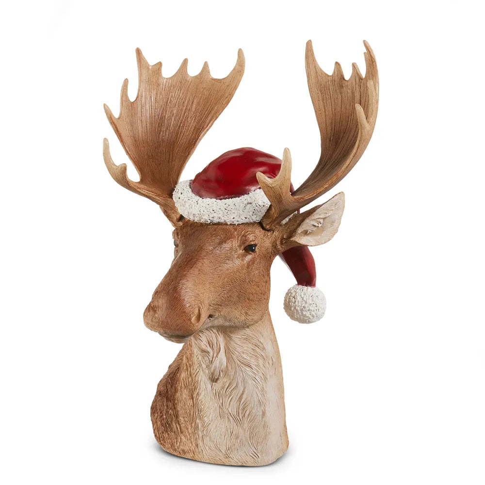 15 inch brown resin moose bust figurine wearing a red Santa hat with white trim