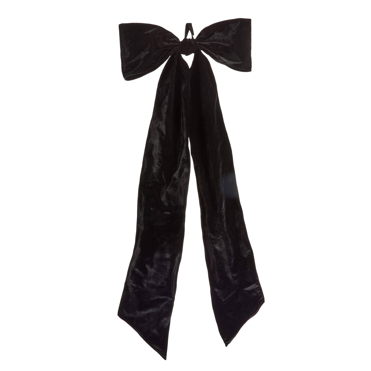 Large oversized velvet bow with two wide loops and long flowing ribbon tails, front view
