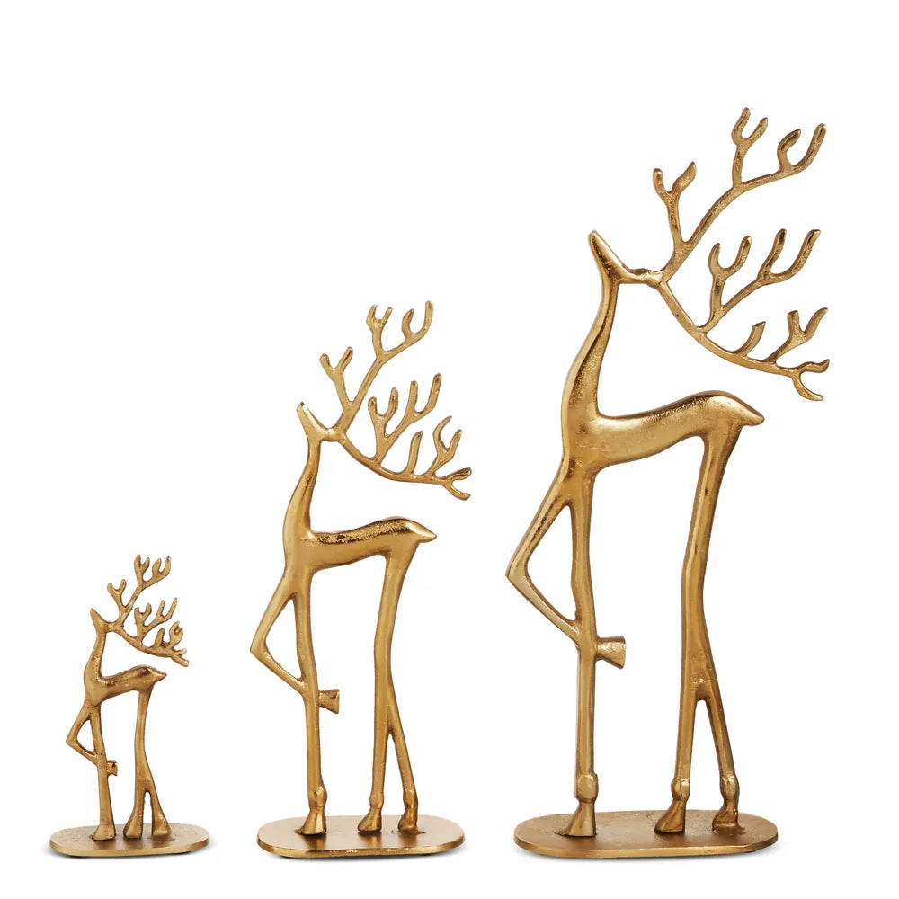Set of three gold iron prancing deer figurines in small, medium, and large sizes