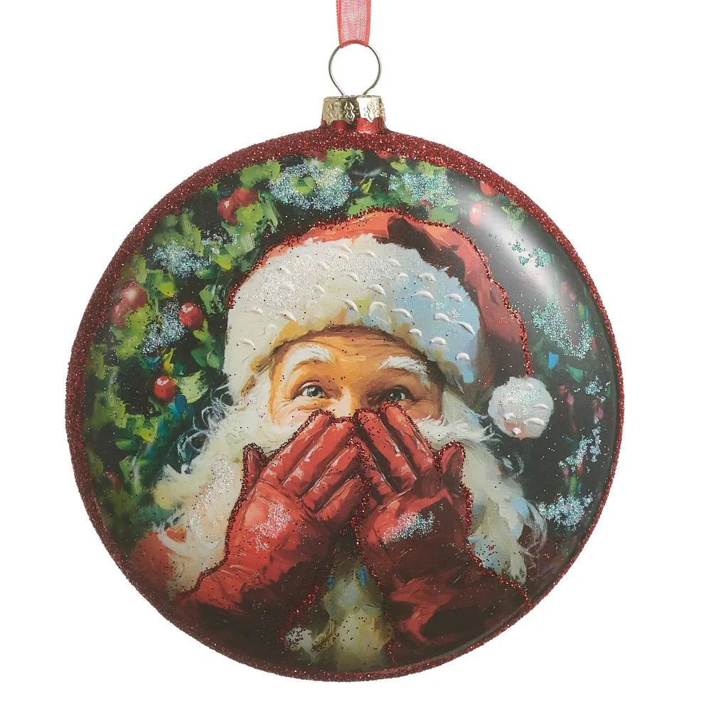 Round red glitter disc ornament featuring vintage Santa Claus with red gloves covering mouth