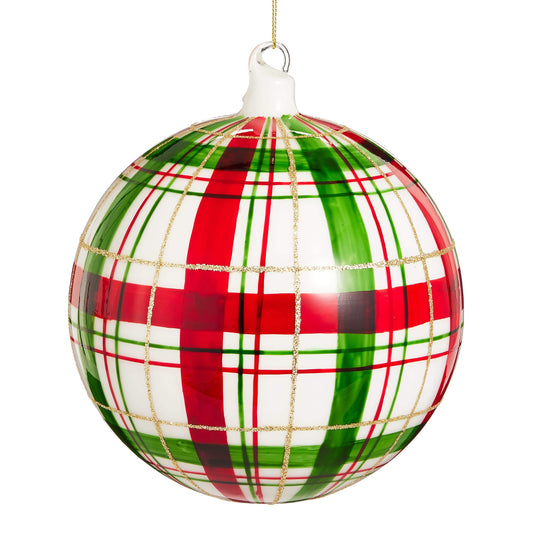 Glossy round Christmas ornament with red, green, and white plaid pattern and gold glitter lines