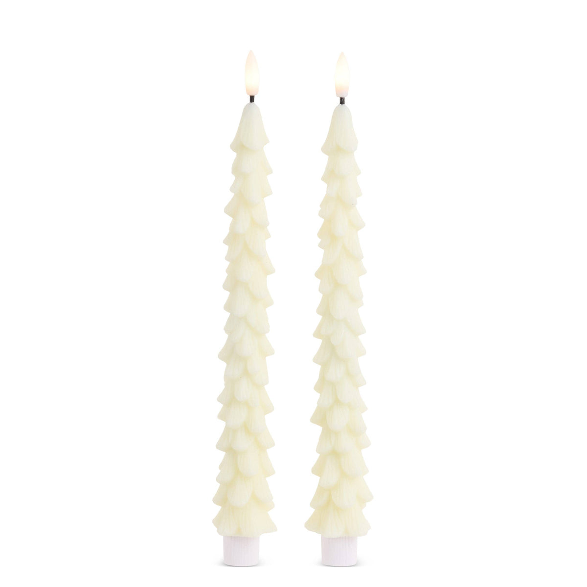 Pair of lit ivory taper candles shaped like textured Christmas trees on white bases