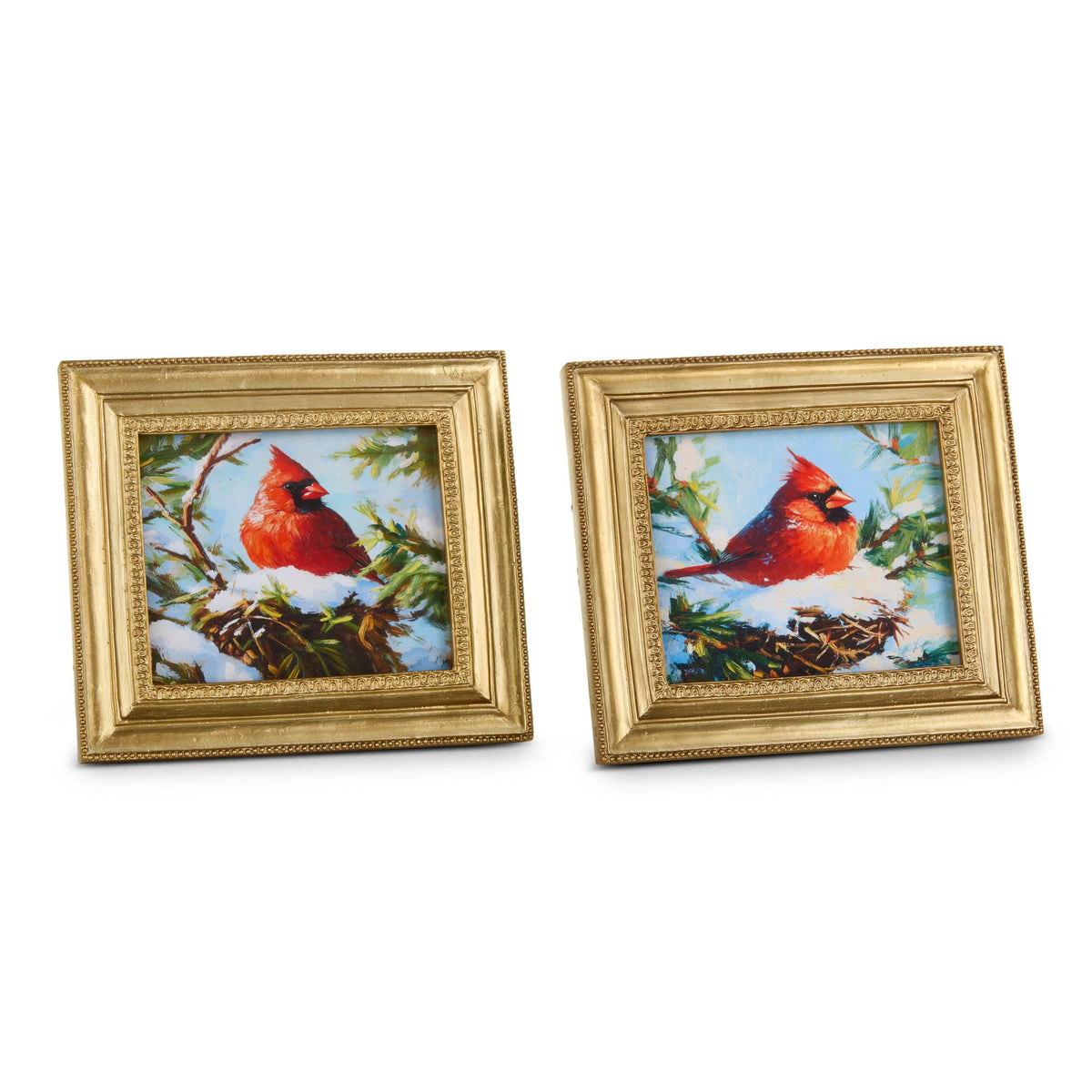Two small gold ornate framed art prints featuring a red cardinal perched on a snowy nest