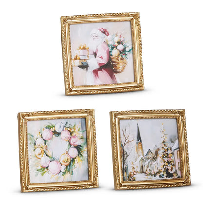 Three gold ornate framed mini Christmas art prints featuring Santa, wreath, and snowy church