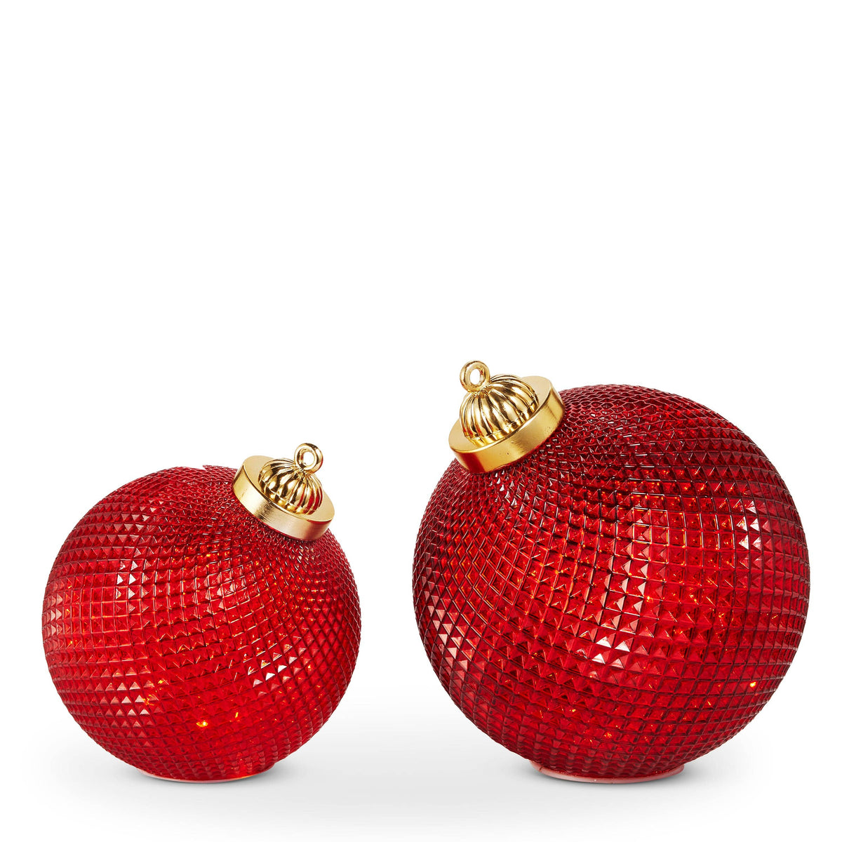 Two red faceted glass ball ornaments with gold caps, lighted, tabletop display, two sizes