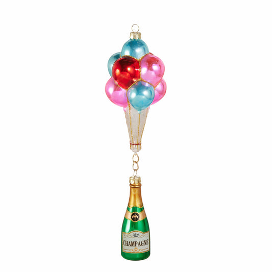 Glass ornament featuring colorful balloons lifting a green champagne bottle, front view