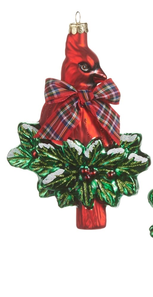 Glass cardinal bird ornament with plaid bow and holly leaves, red and green
