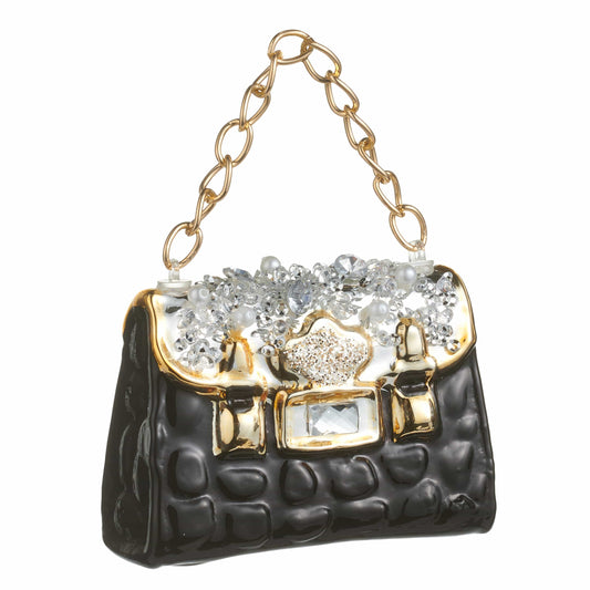 Quilted black purse ornament with gold chain handle and crystal jewel embellishments, angled view
