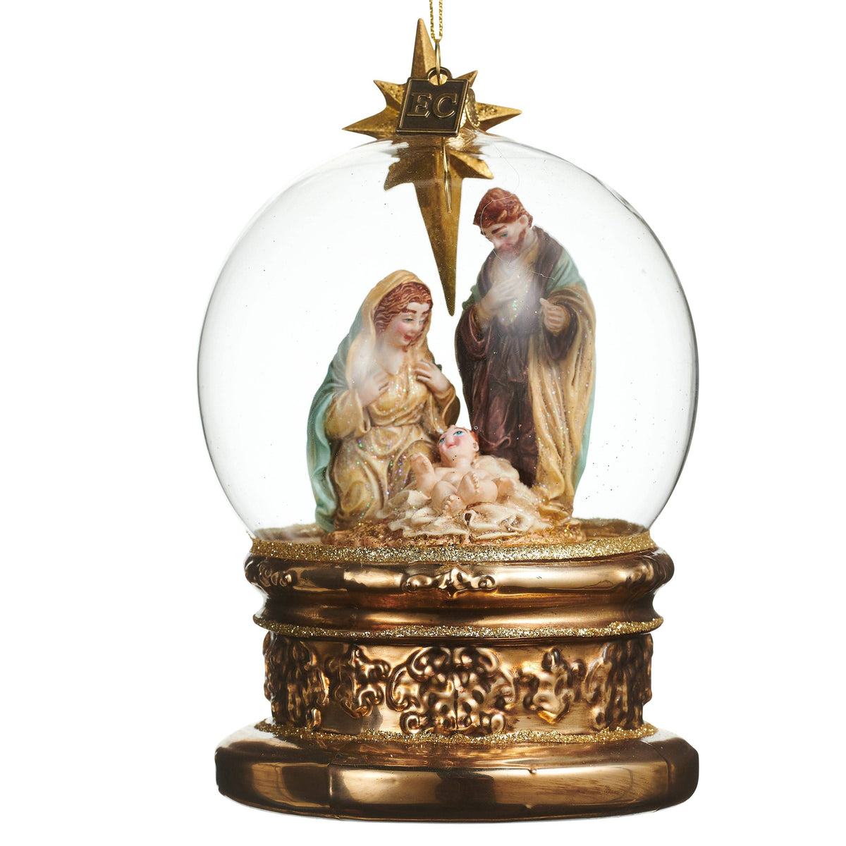 Glass globe ornament with nativity scene figurines on ornate gold base with star topper