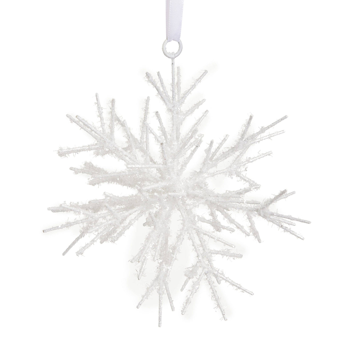 White glittery snowflake ornament with twig-like branches hanging from a white ribbon