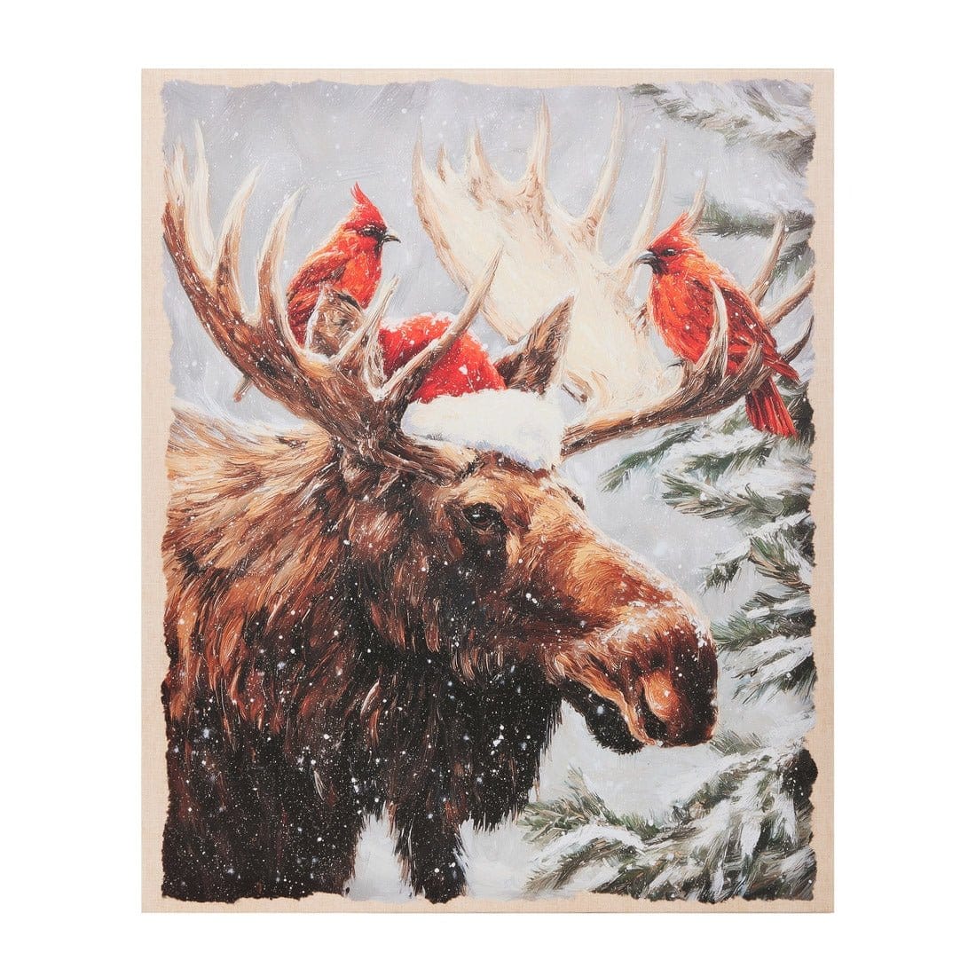 Framed wall art depicting a moose wearing a Santa hat with two red cardinals perched on its antlers in a snowy forest