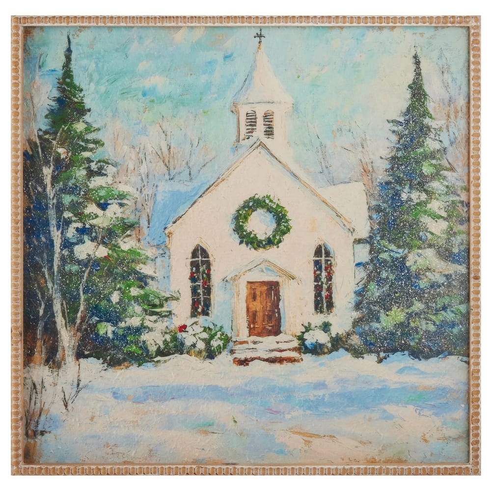Framed painting of snow-covered white church with Christmas wreath and evergreen trees