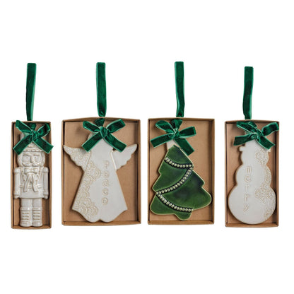 Mudpie white ceramic Christmas ornaments: nutcracker, angel, tree, snowman with green velvet ribbons