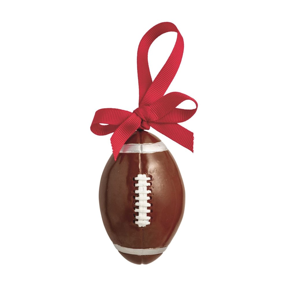 Football-shaped Christmas ornament with white laces and red grosgrain ribbon bow, front view