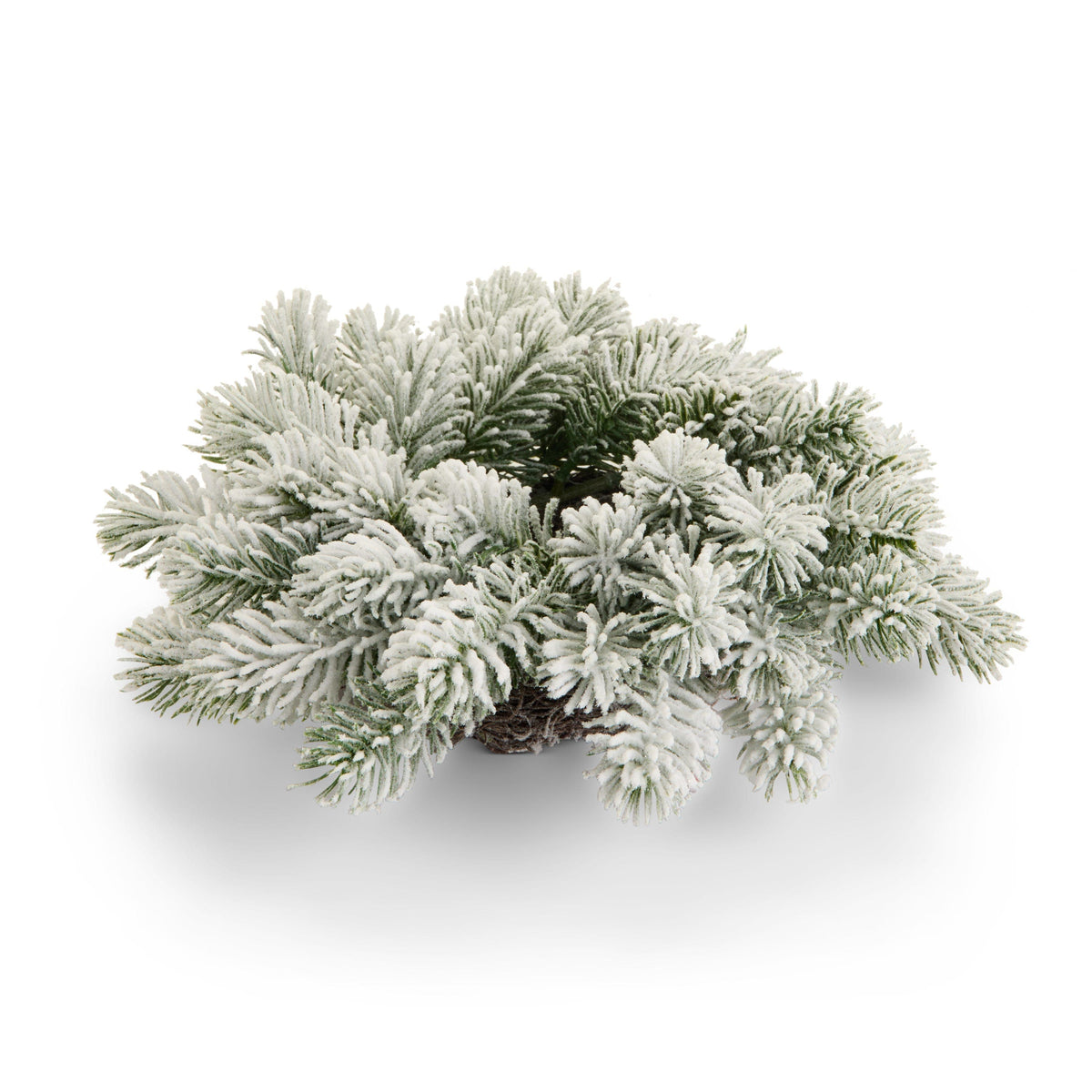 Snow-flocked pine needle wreath ring in circular form, top-angle studio view