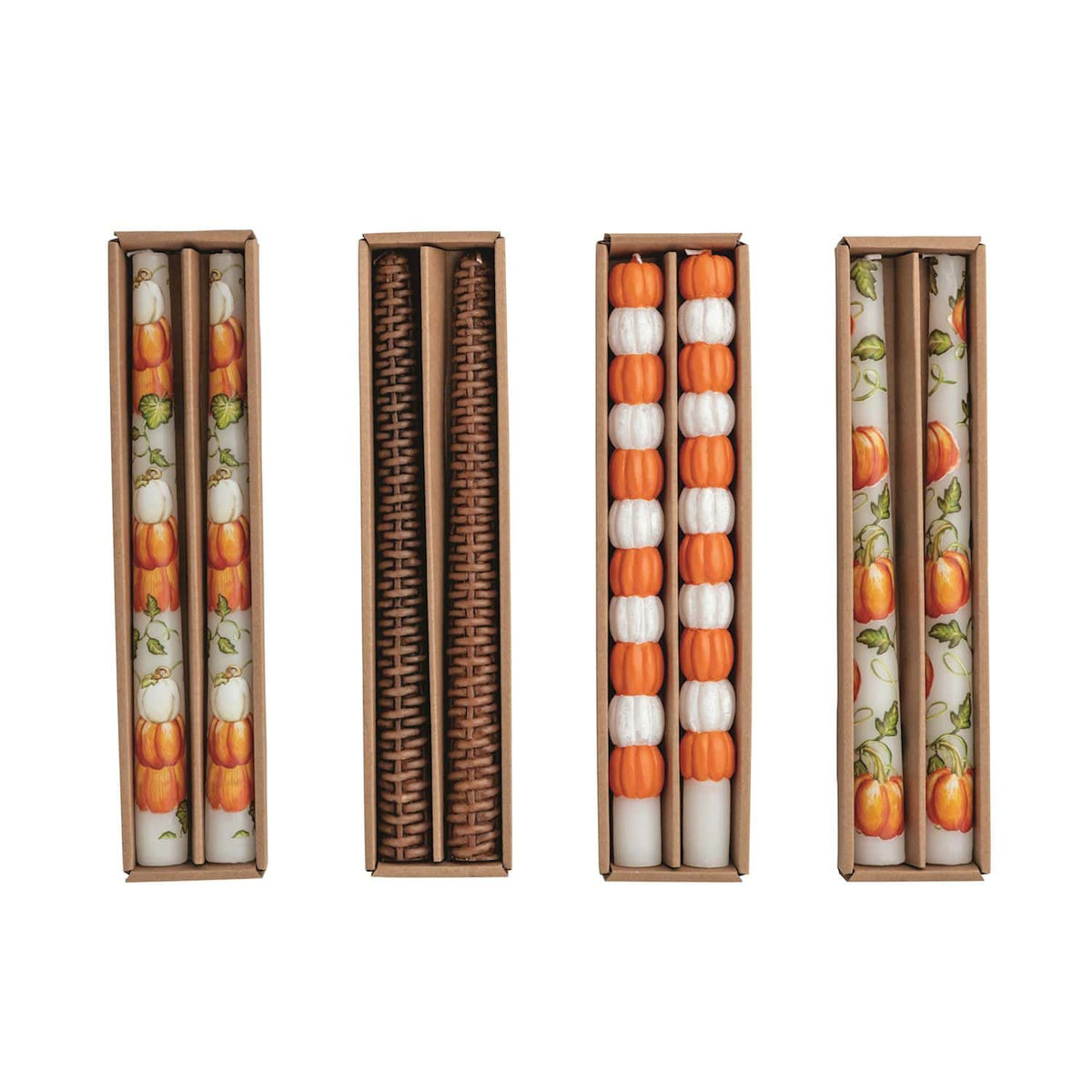 Four boxed fall taper candle sets with pumpkin, rattan, and vine patterns in orange and white
