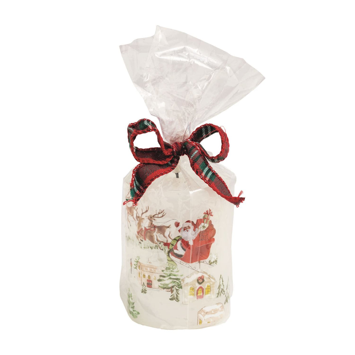 White flameless pillar candle with Santa sleigh scene, wrapped in clear bag with plaid bow