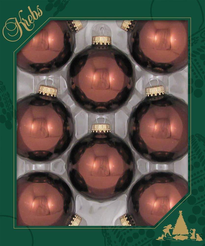 Eight shiny brown glass Christmas ball ornaments with gold caps in retail packaging, top view